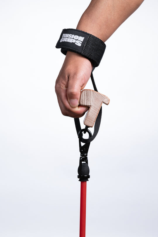 Hand using a climbing device with a white background